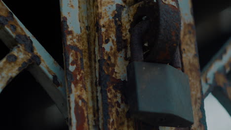 The-rusted-iron-door-was-locked-with-an-old-lock