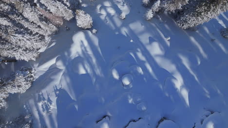 Dreamy-Vail-Epic-Ikon-Pass-Colorado-aerial-drone-bluesky-back-bowl-Cup-Cakes-pillows-sunny-shaded-fresh-deep-powder-snow-snowboard-ski-snowmobile-rock-boulder-cinematic-birdseye-upward-circle-pan-left