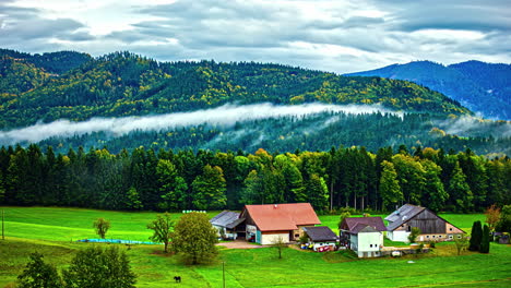 Timelapse-of-cloudscape-over-remote-homestead-in-Austrian-alps