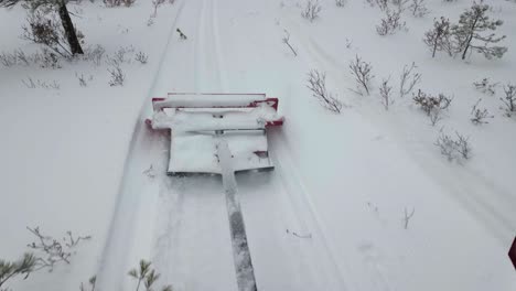 POV-Of-A-Laying-Cross-Country-Ski-Tracks-With-Snow-Scooter-In-Winter-Season