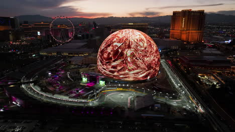 Las-vegas-F1-street-circuit-and-the-Sphere-arena,-evening-in-USA---Aerial-view