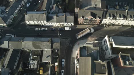 Aerial-View-Of-Loaded-Truck-Leaving-Dundalk-Town-Port-In-Ireland