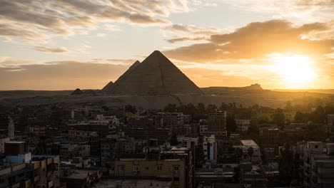 Golden-sunburst-over-famous-tourist-landmark-of-Great-pyramids-of-Giza