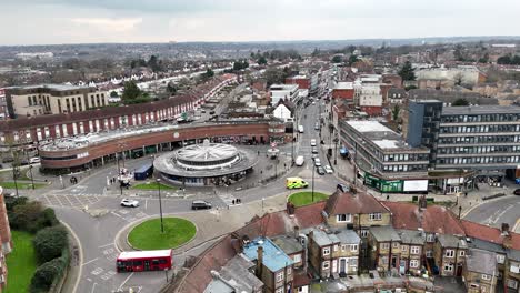 Ambulance-driving-around-Southgate-Circus-London-UK-drone,aerial