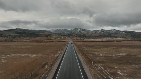 Panoramic-Aerial-View-Of-A-Road-Near-Sun-Valley,-Sawtooth-Mountain-National-Forest-In-Idaho,-USA