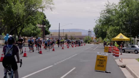 Runners-down-the-road-at-the-Intermountain-Health-IRONMAN-70