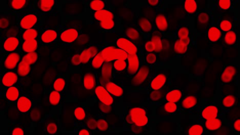 Animation-of-red-swirling-background-of-defocused-colorful-dots