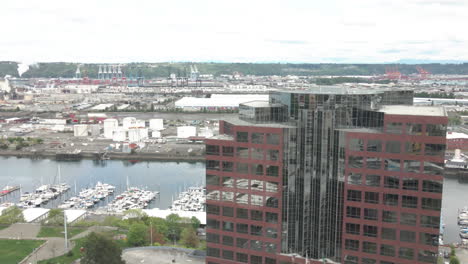 AERIAL-DRONE-SHOT-OF-TACOMA-WASHINGTON-PORT-AND-BOAT-DOCK