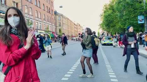 Slomo-pan-of-protesters-dancing-at-climate-demonstration-in-Stockholm