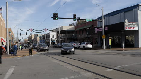 A-television-photojournalist-shoots-the-"Loop-Trolley,"-traveling-up-Delmar-Ave