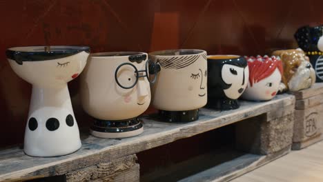 Quirky-Character-Face-Pottery-Collection,-La-Candela-Store-Venice