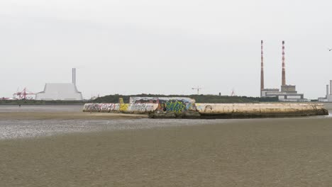 Sandymount-Swimming-Baths-And-Poolbeg-Generating-Station-In-Daytime