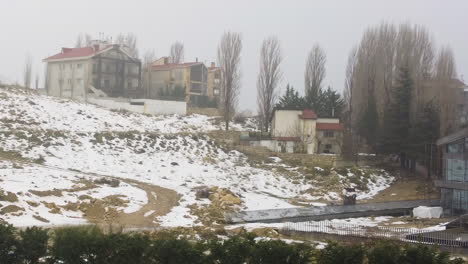 Winter-snow-blankets-the-mountain-village-of-Kfardebian,-Lebanon