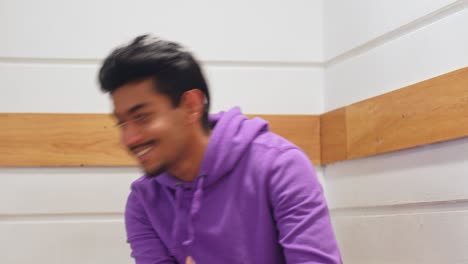 Handsome-Sri-Lankan-man-with-purple-jumper,-front-view