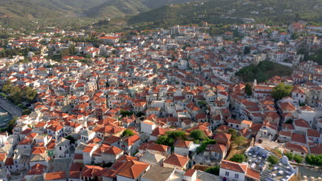 Aerial-view-of-Skopelos-town-in-Skopelos-island-in-Aegean-Sea,-Greece-during-sunset