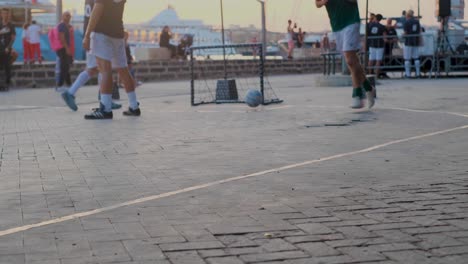 Courtside-View-of-Quick-Build-Up-and-One-Touch-Goal-During-Golden-Hour-at-Street-Soccer-Tournament