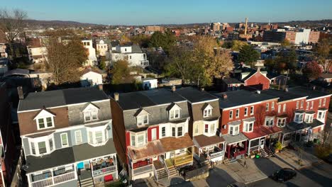 Colorful-rowhouses-in-urban-city-in-America-during-autumn-sunset