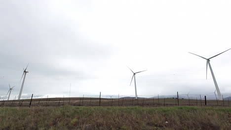 Passing-On-Wind-Power-Turbines-In-The-Countryside-Farmland