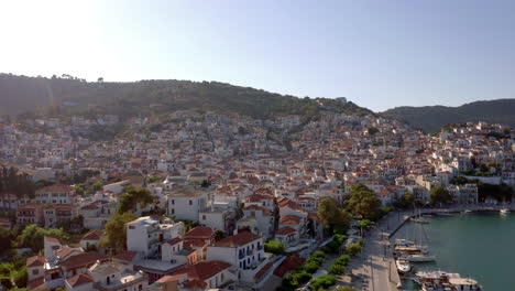 Aerial:-Fly-over-the-beautiful-Skopelos-town-in-Skopelos-island,-Sporades,-Greece