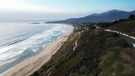 paragliding-over-beach,-Valparaíso-region,-country-of-Chile