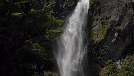 Slow-Motion-static-footage-of-the-top-of-the-Devil's-Punchbowl-Waterfall---Arthur's-Pass,-New-Zealand