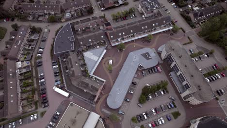 Aerial-view-of-commercial-shopping-mall-in-residential-neighborhood-of-Warnsveld-in-The-Netherlands
