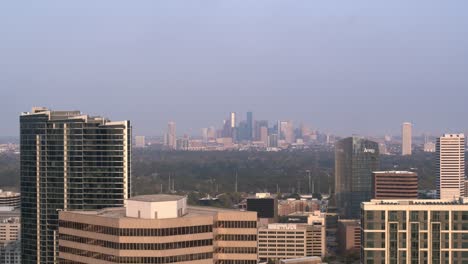 High-angle-drone-shot-of-buildings-and-surrounding-area-in-Uptown-Southwest-Houston