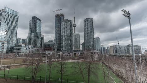 School-Athletic-Field-With-A-View-Of-CN-Tower-And-Toronto-Skyline-In-Ontario,-Canada