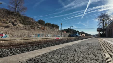 Regional-Renfe-train-arriving-and-departing-from-a-local-train-station