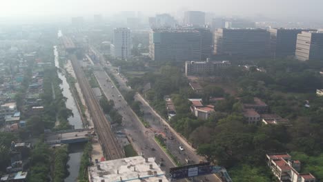 Aerial-foggy-shot-of-chennai-commercial-area-with-corporate-buildings-sunrise