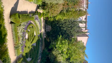 Garden-at-Hotel-de-Caumont-in-Aix-en-Provence-in-France,-vertical