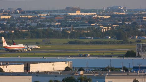 Commercial-planes-touching-down-at-the-airport