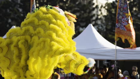 Asian-People-Performing-Traditional-Lion-Dance-At-Chinese-New-Year-Celebration-In-Taipei,-Taiwan