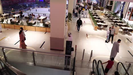 Dubai-Mall-Interior,-Crowd-of-People-Moving-on-Shopping-Levels-and-Escalators