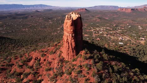 Aerial-View-of-Sandstone-Tower-in-Desert-Landscape-of-Sedona,-Arizona,-Revealing-Drone-Shot-of-Vastness