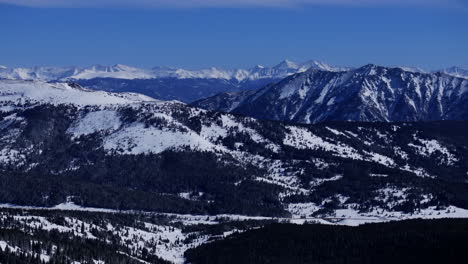 Vail-Pass-Colorado-aerial-drone-landscape-i70-Copper-Mountain-Silverthorne-Frisco-Grays-and-Torreys-Tenmile-peak-sunny-winter-morning-fresh-snow-blue-sky-Rocky-Mountains-Continental-Divide-upward