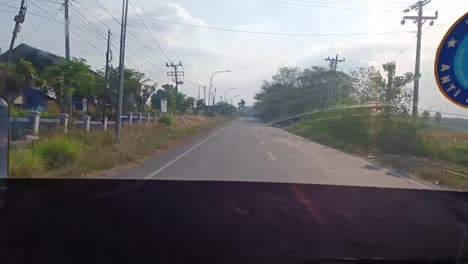 Pov-inside-a-bus-in-Cepu,-Blora,-Central-Java,-Indonesia