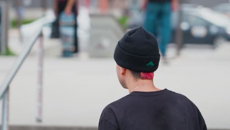 Close-up-Shot-of-a-Young-Male-Skateboarding-Teenager-Riding-Around-a-skatepark