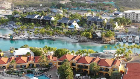 Panning-aerial-of-luxurious-seaside-resorts-by-Mambo-Beach-at-Curaçao