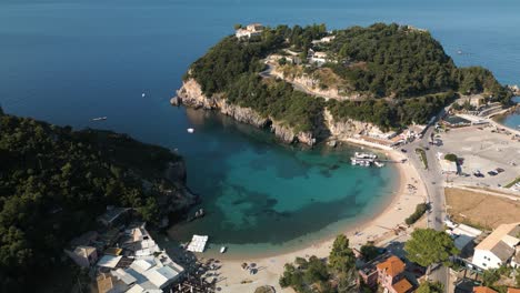 High-angle-static-overview-of-calm-golden-sandy-bay-in-Corfu-Greece