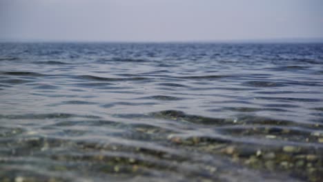 Small-waves-on-the-pebble-beach