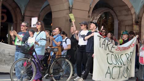 Protesters-at-climate-demonstration-march-in-Sweden,-static-side-view