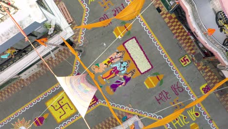 Aerial-drone-view-Dawn-camera-shows-Jai-Shri-Ram-Jai-Shri-Ram-written-all-over-the-road-between-residential-houses-and-a-large-rangoli-of-Shri-Ram-is-also-dronee-in-the-middle