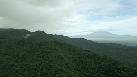Aerial-view-of-picturesque-menoreh-hills,-Indonesia-in-cloudy-morning