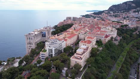 Aerial-View-Old-Town-of-Monte-Carlo-Rock-of-Monaco-Hill-Above-Mediterranean-Sea,-Prince's-Palace,-Cathedrals-and-Museums,-Drone-Shot