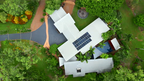 Aerial-drone-of-Rural-Prestigous-Tropical-Style-Home-with-Solar-Panels-Top-Down-Descend