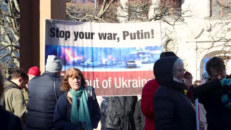 Sign-in-English-asking-Putin-to-stop-war-in-Ukraine-at-rally-in-Sweden