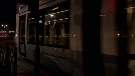 Dubai-Metro-Train-Passing-on-Railway-at-Night