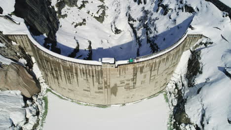 Aerial-of-a-dam-in-winter