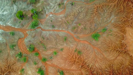 Mesmerizing-aerial-adventure-as-we-soar-above-the-surreal-landscape-where-the-vibrant-red-and-striking-grey-deserts-converge-in-the-heart-of-Tatacoa